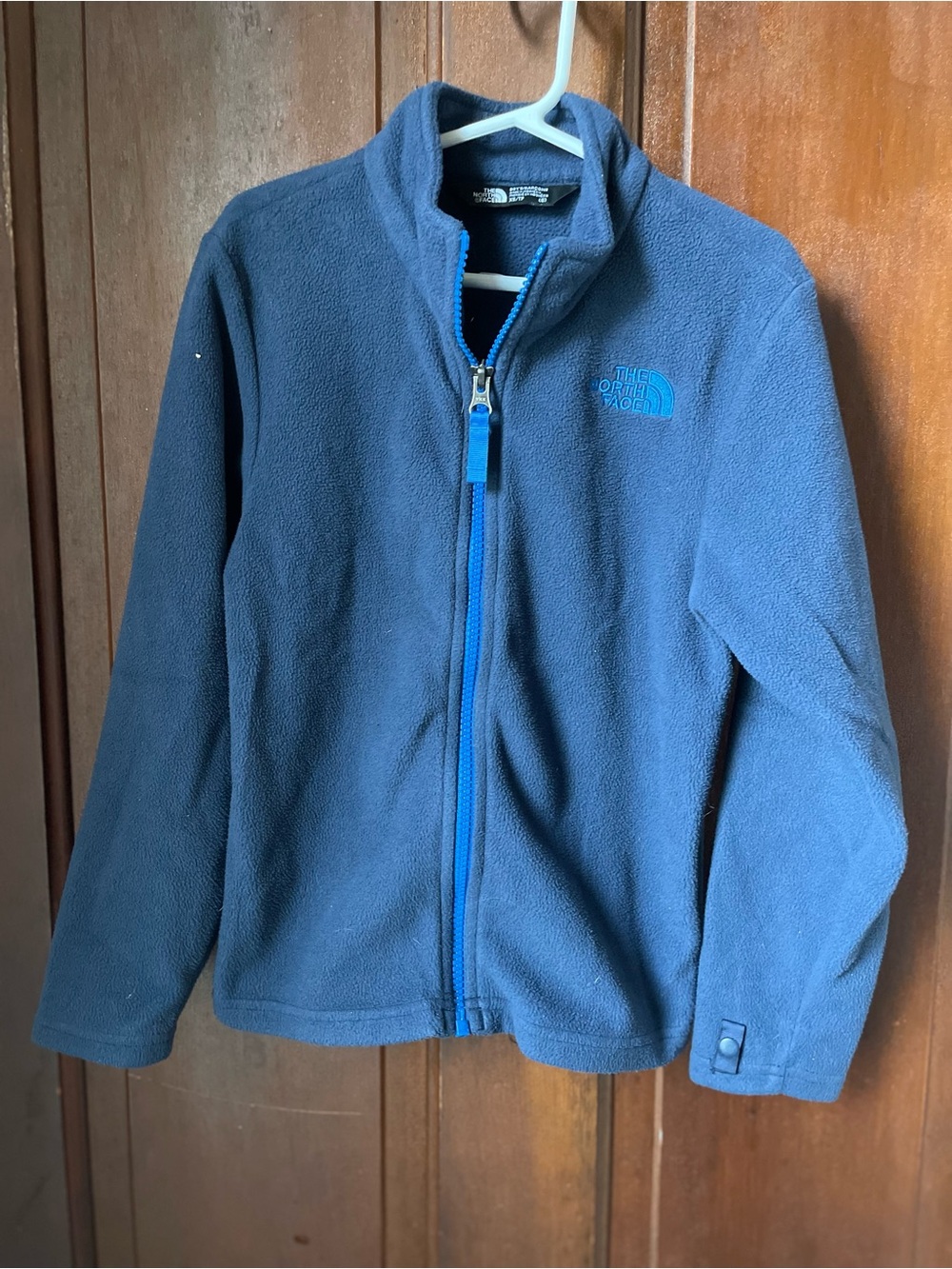 The North Face kids extra small blue fleece jacket